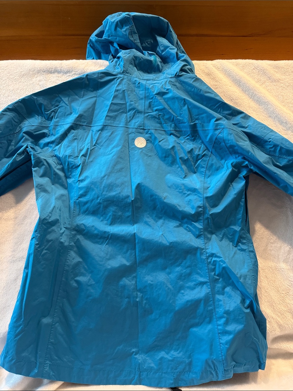 Marmot women’s turquoise/Blue Hooded Rain Jacket - Picture 8 of 11